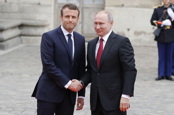 French President Emmanuel Macron shakes hand with Russian President Vladimir Putin at Palace of Versailles, in Versailles, France on May 29th, 2017. Photo by Henri Szwarc/ABACAPRESS.COM